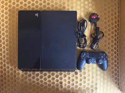 Sony PlayStation 4 with DualShock 4 Controller and Cables - Good Working Condition