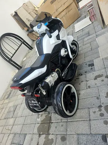 Kids Electric Ride-On Motorcycle - 3-Wheel Battery Powered needs battery replacement