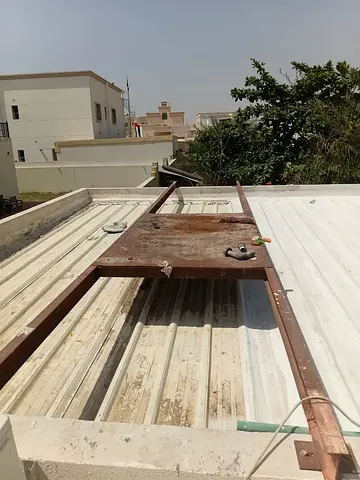 Rusty Rooftop Ladder/Platform Frame