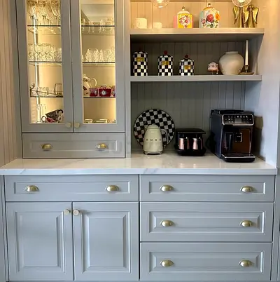 Built-in Grey Kitchen Cabinetry with Marble Countertop