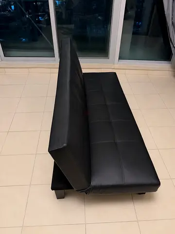 Black faux leather futon sofa cum bed - good condition