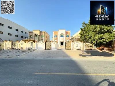 Villa for sale in Al Rawda, Ajman, including electricity, water, and air conditioning. Freehold ownership for all nationalities and inheritable by chi