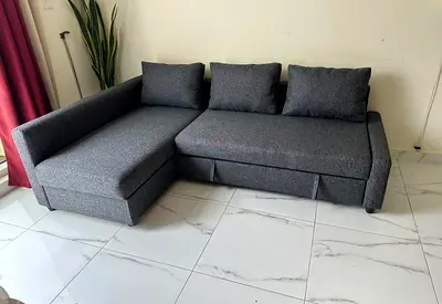 Ikea L shape sofa store cum bed and you can fix the storage