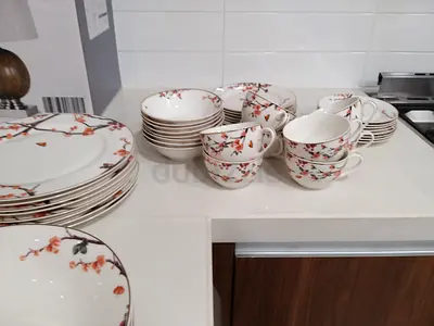 64 piece floral porcelain dinnerware set - gently used