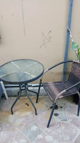 Small outdoor bistro set – glass top table with two wicker chairs