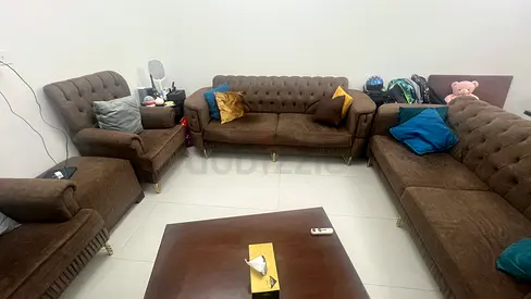 8 seater brown sofa set with armchairs and ottoman — good condition