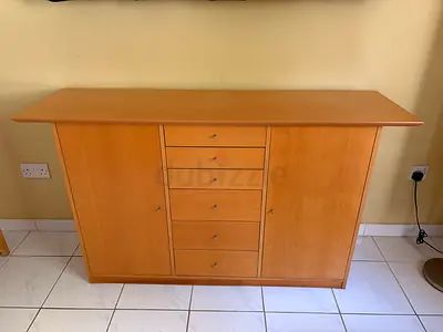 Light wood sideboard cabinet with five drawers and two cupboards — good condition