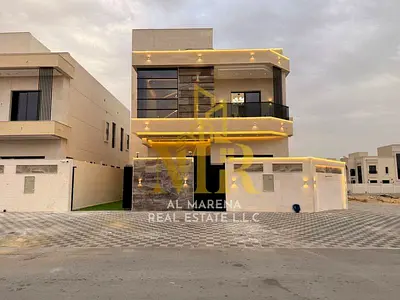 Corner villa for sale in Ajman | Al Helio 2 area | 5 bedrooms, majlis, 2 living rooms, and a roof t