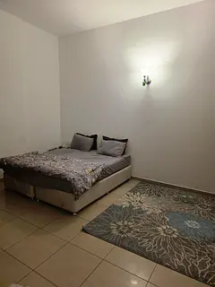 Fully furnished master bedroom with attached bathroom and private balcony available for rent