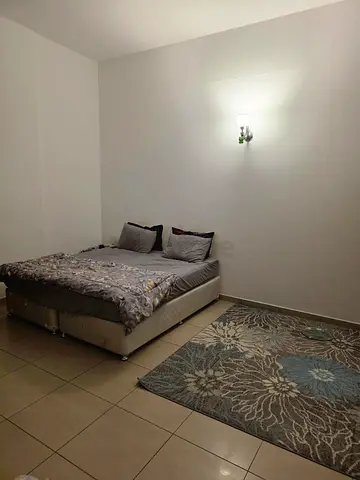 Fully furnished master bedroom with attached bathroom and private balcony available for rent