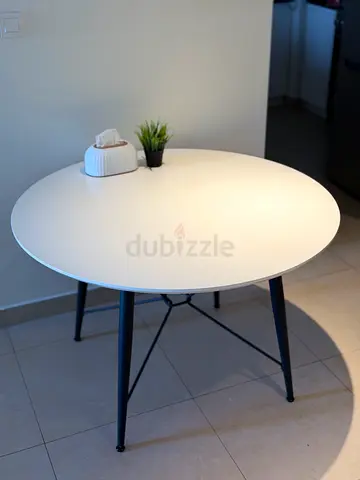 Round White Dining Table with Black Metal Legs