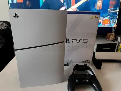 PlayStation 5 Slim disk version 1Tb Console with Box and Two DualSense Controllers - Good Condition