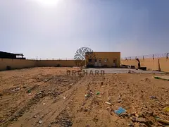 10,000 sqft open yard with power connection, suitable for storage or business use – rent AED 110K 