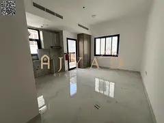 First-occupancy studio for annual rent in Al Alia, Ajman, free month, flexible payments, high-end fi