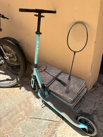 Kids kick scooter with badminton racket  - used