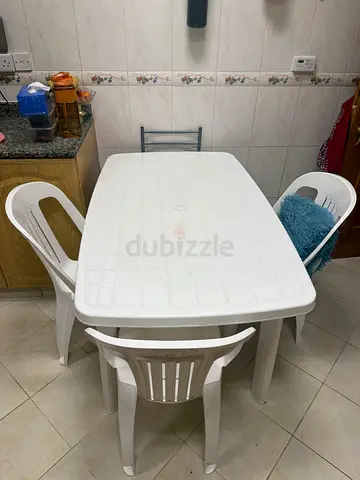 White Plastic Outdoor Dining Table with 4 Chairs