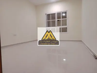 One-bedroom apartment with hall in Al Rawda 2, open view balcony, family building, large space. 29,000 yearly, 4 payments, prime location, close to se