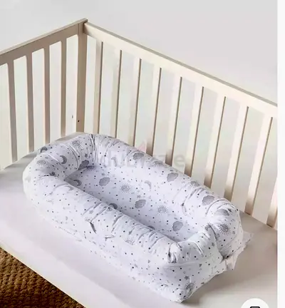 Bed rail and sleeping nest