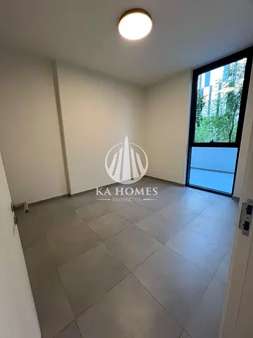 Own an apartment in the Aljada project