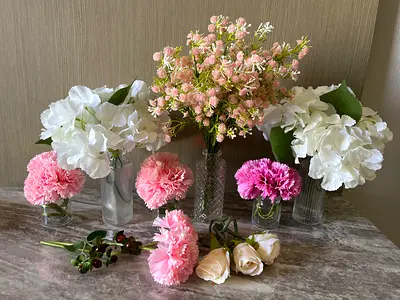 Vases with artificial flowers
