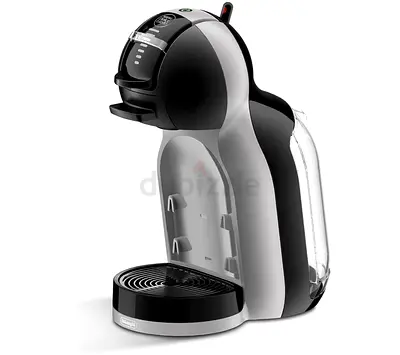 Used single-serve capsule coffee machine (compact) - good condition (used once)
