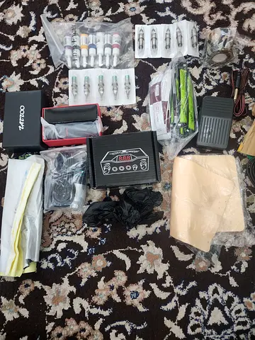 Tattoo machine kit with power supply and needles - used set