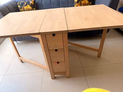 Extendable wooden dining table with storage drawers from ikea- light beech