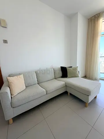 Light gray L-shaped corner sofa with chaise - perfect condition