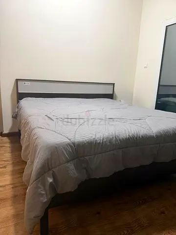 Queen size bed frame with headboard - good condition