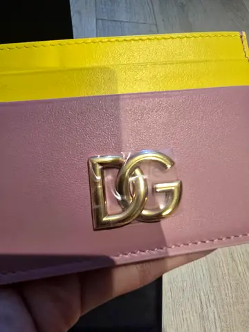 Small pink and yellow womens cardholder with gold Dolce Gabbana logo