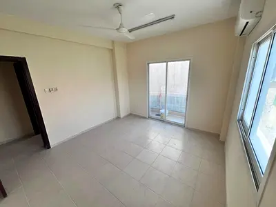 2BHK apartment for annual rent in Al Rawda 3 Ajman, ground floor, second tenant, master room, balcony, central AC, free maintenance, prime location ne