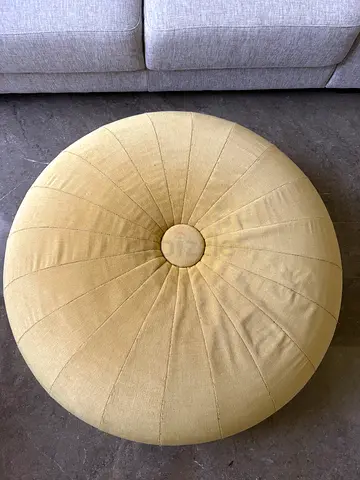 THE ONE large mustard yellow floor pouffe
