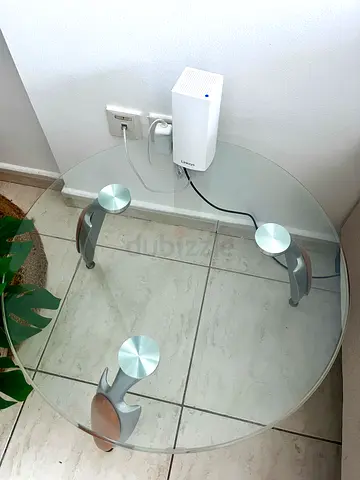Round Glass Side Table with Silver Curved Legs