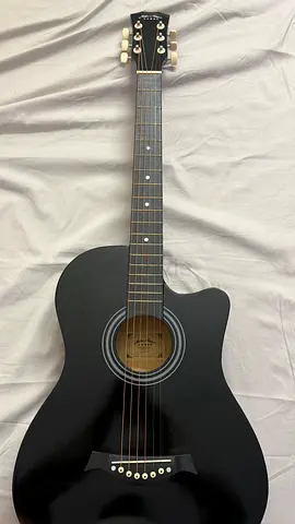 Almost New Guitar (1 Month Old) + Bag + Box – AED 300