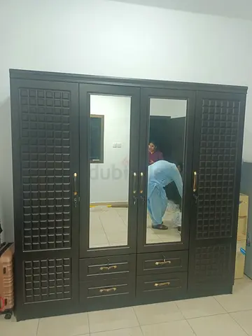 Hi sir and madam available 4 door cabinet brand new