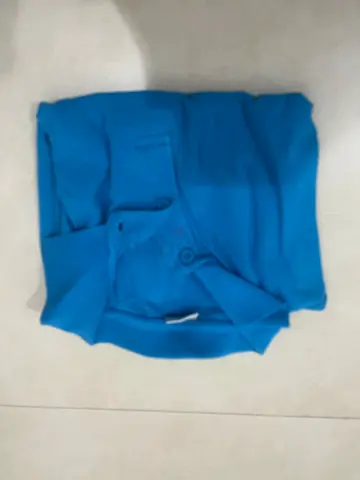 Blue short-sleeve polo shirt - gently used