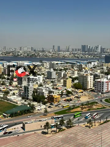 غرفتين وصالة للايجار السنوي بعجمان ببرج البستان_باركن مجاني_تكيف مجاني_بلكون اطلالة بانورمية_خزائن حائط_موقع مميز قريب من جميع الخدمات