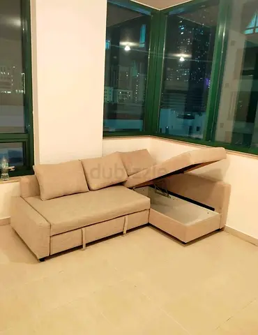 Ikea L Shape Sofa cum bed with big storage in L