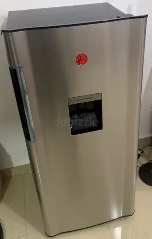 Single Door Stainless Steel Refrigerator with Water Dispenser - Good Condition