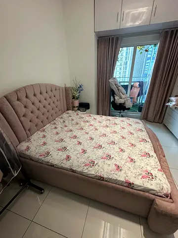 pink bed with mattress