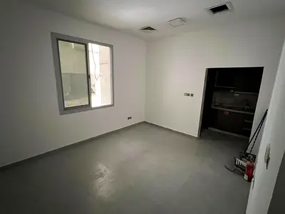 Studio apartment for annual rent in Al Rawda 1, behind Al Hamidiya Police Station. 19,000 AED in 4 installments. Ground floor. Spacious, high-end fin