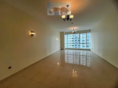 Largest 3-bedroom apartment in Al Taawun with sea view, free AC by landlord, built-in wardrobes, prime location near Al Khan Corniche