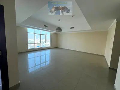 اجمل واكبر غرفتين وصاله بالتعاون\بلكونه\اطلاله مفتوحه\تكيف مركزي مجاني\جيم\تشطيبات ممتازه\موقع مميز علي مخرج دبي\قريب من كل الخدمات