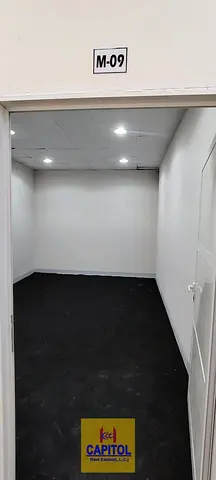 Simple, clean warehouse space ideal for companies needing accessible storage solutions in Al Quoz 3