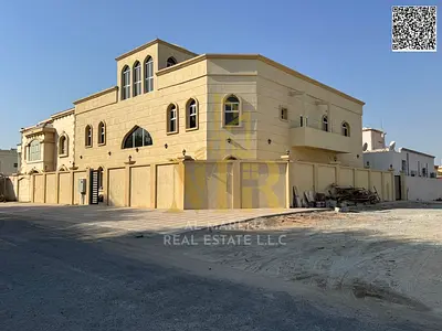 Al Muwaihat 3 Corner Villa, 8000 sq ft, two floors plus roof, 12 master bedrooms, majlis, five livi