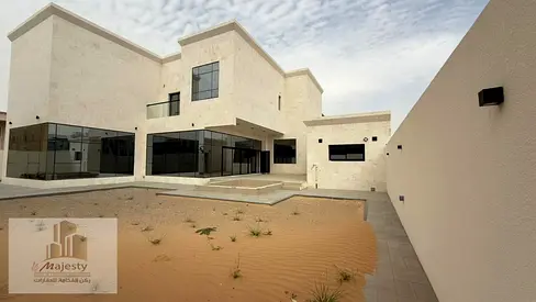 Luxury villa for sale in Al-Houshi with an area of 10,000 sq ft, 5 bedrooms + majlis + living room + dining room, with a panoramic view of the garden