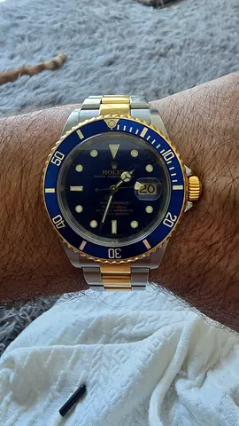 Rolex Submariner two-tone (steel  yellow gold) with blue dial/bezel