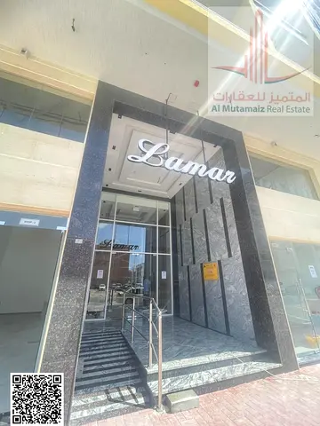 Two bedrooms and a living room for annual rent in Ajman, first occupancy, in Lamar building in Al Jurf 3, asking price 41,000 AED