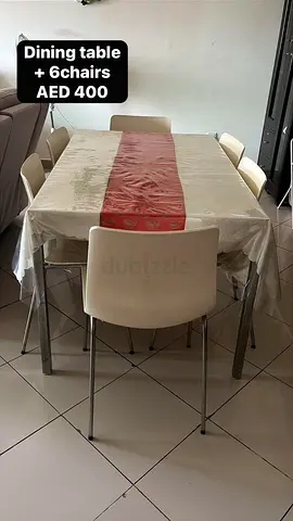 Dining table with 6 chairs - simple modern set (AED 400)