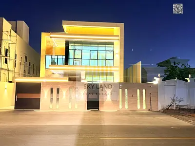 Fully smart villa with a modern facade and elegant design, including water, electricity, and air conditioning.